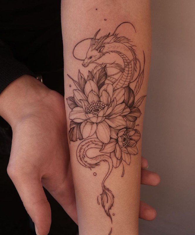 Dragon tattoo on the forearm for men