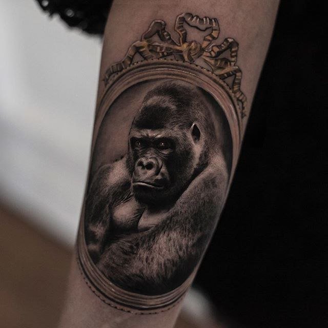 Tattoo of a gorilla on the arm