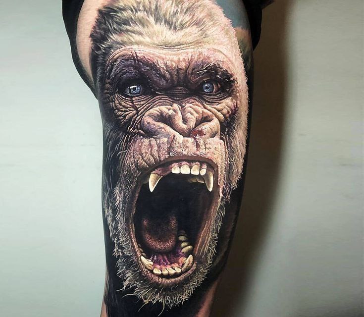 Gorilla tattoo on the thigh for men