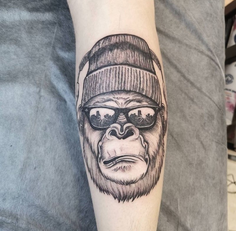 Gorilla tattoo on the calf for women