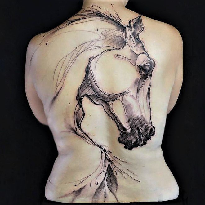 Tattoo of a horse on the back for women