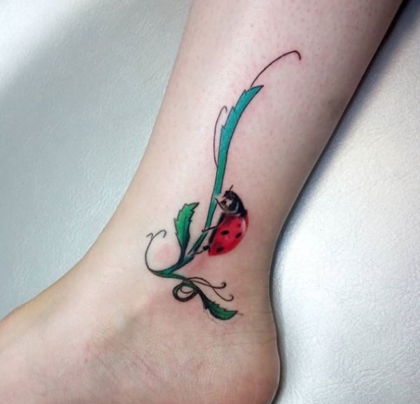 Ladybug tattoo on ankle for women