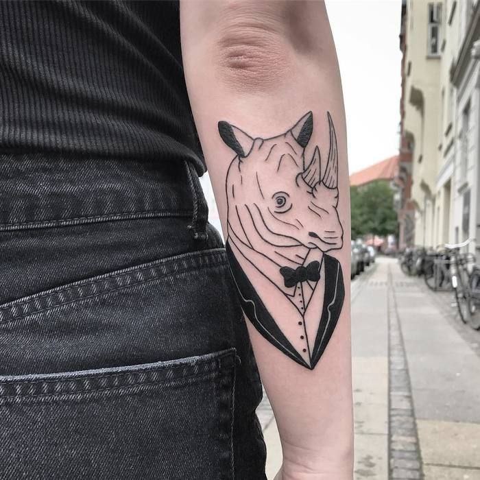 Rhinoceros tattoo on the forearm for men