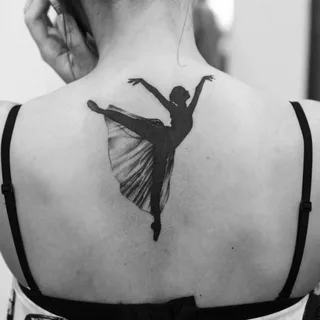 Ballerina tattoo on the back for women