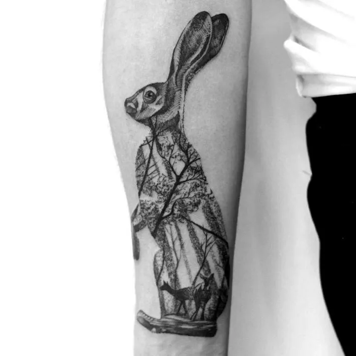 Tattoo of a hare (rabbit) on the forearm for men