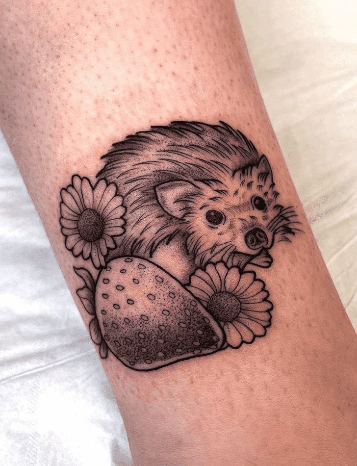 Tattoo of a hedgehog on the shin for men