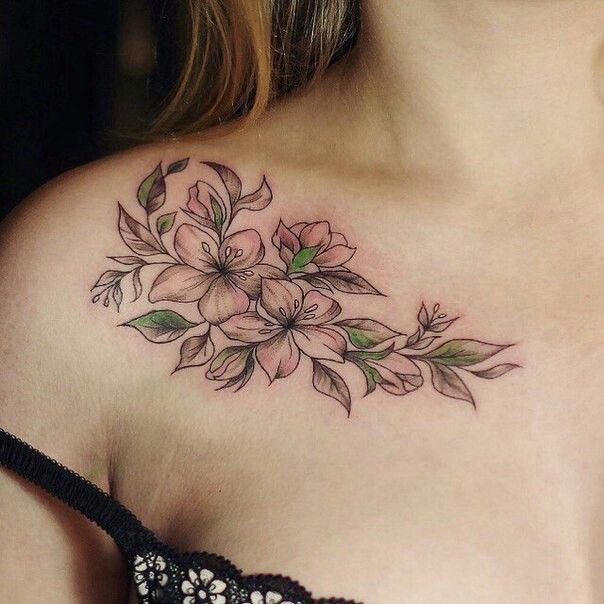 Jasmine tattoo on the collarbone for women