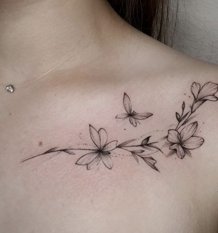 Jasmine tattoo on the collarbone for women