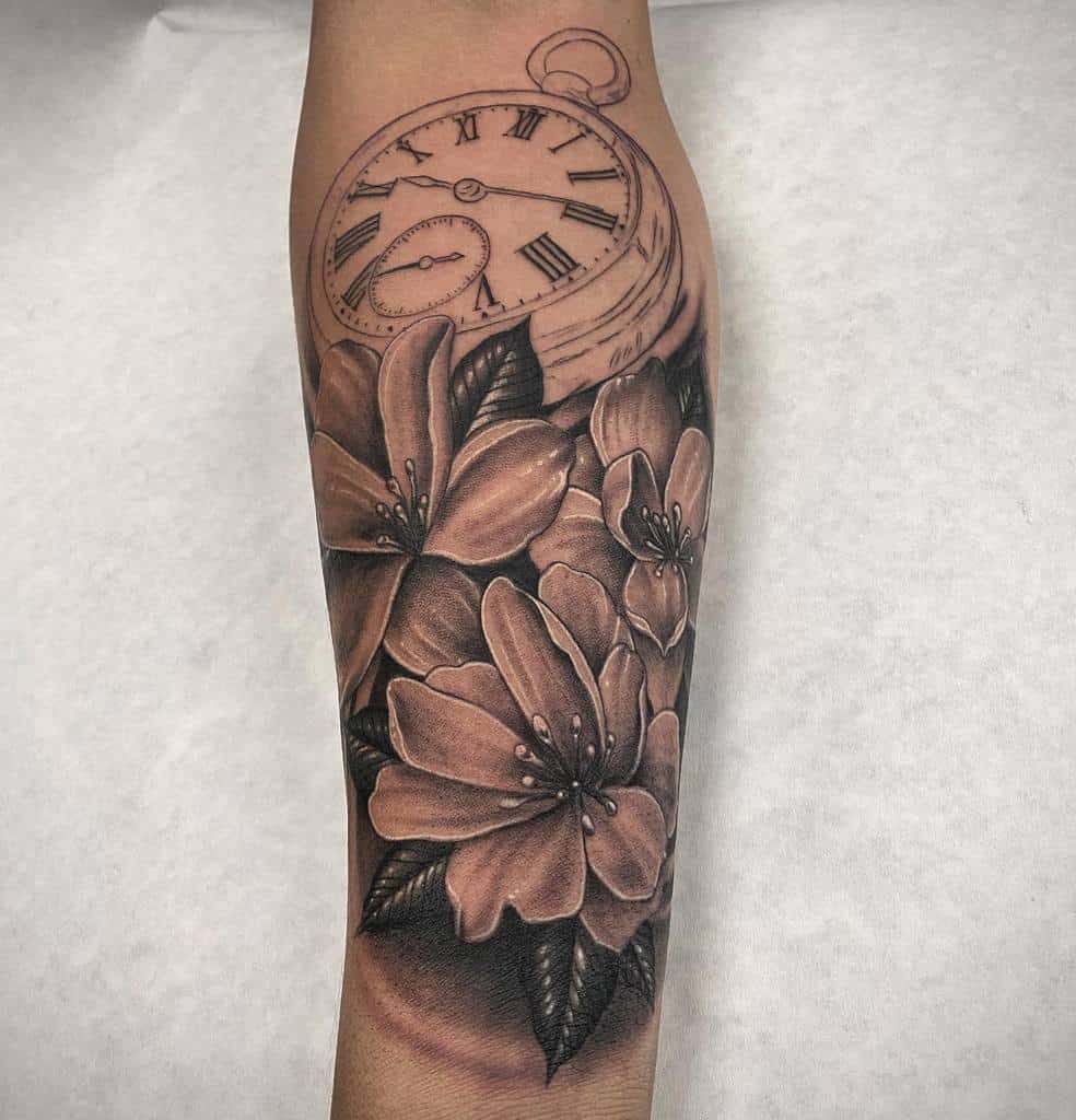 Jasmine tattoo on the forearm for women