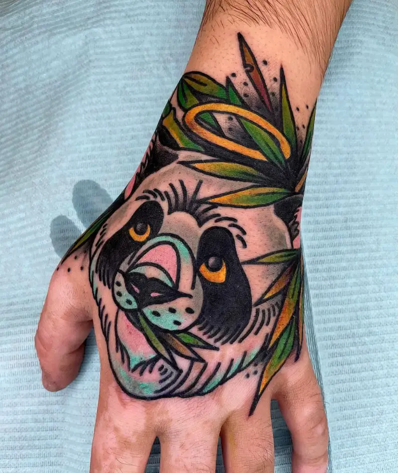 Colored panda tattoo on the hand for men