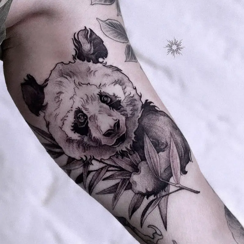 Panda tattoo on the shoulder for men