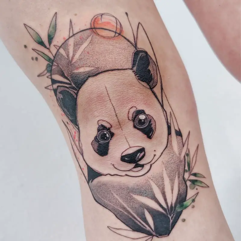 Panda tattoo on the leg for women