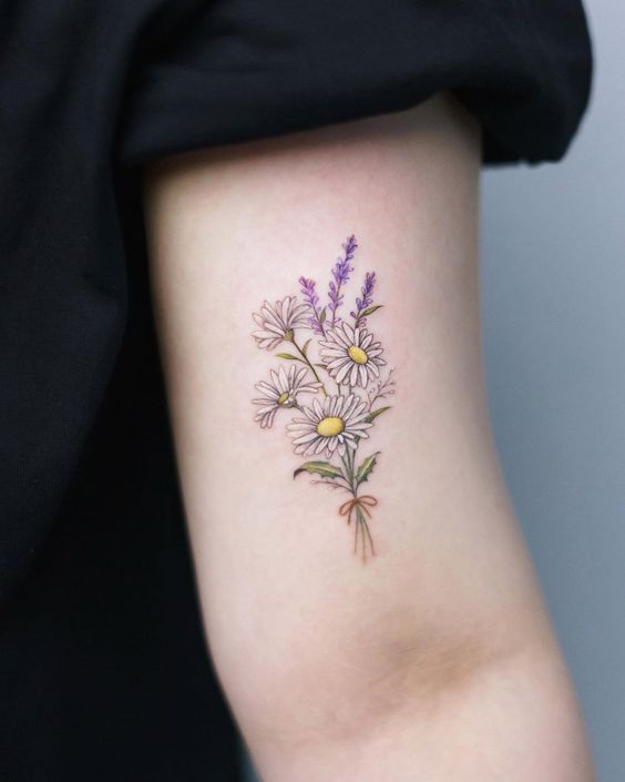 Daisy and lavender tattoo on the shoulder for women