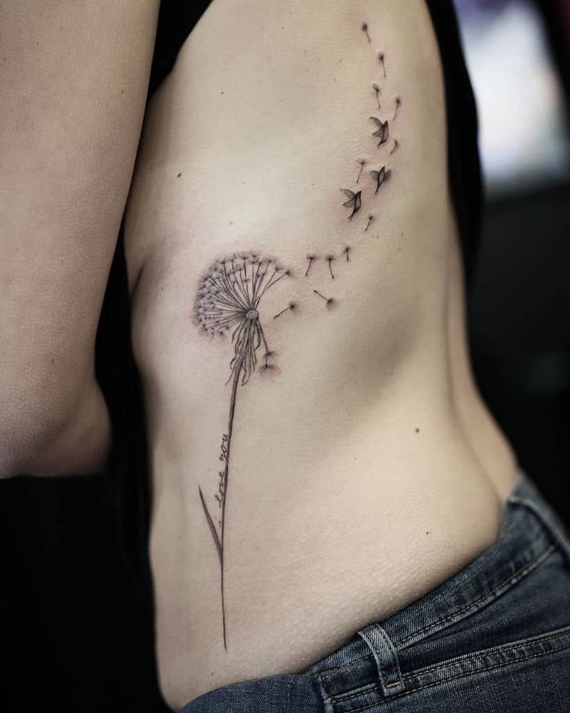 Large dandelion tattoo on the side for women