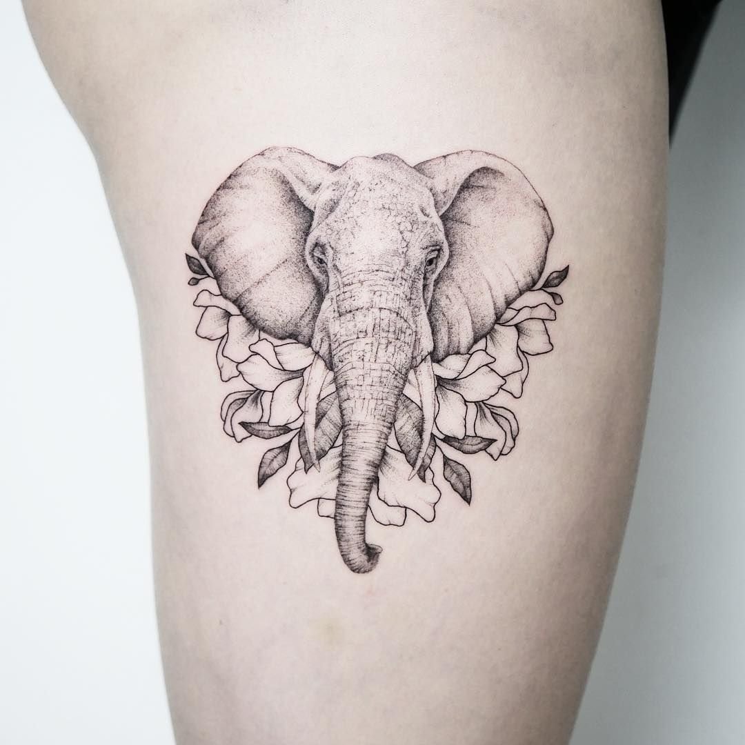 Elephant tattoo on the hip for women