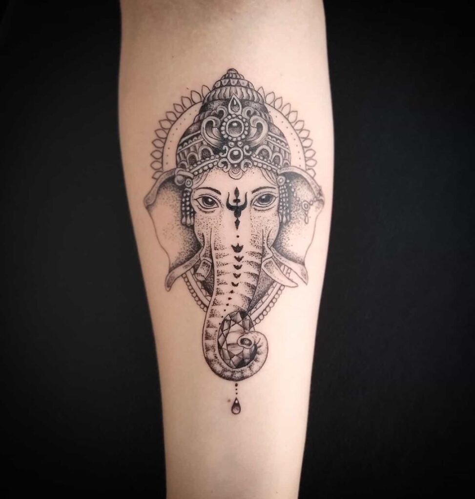 Elephant tattoo on the forearm for women