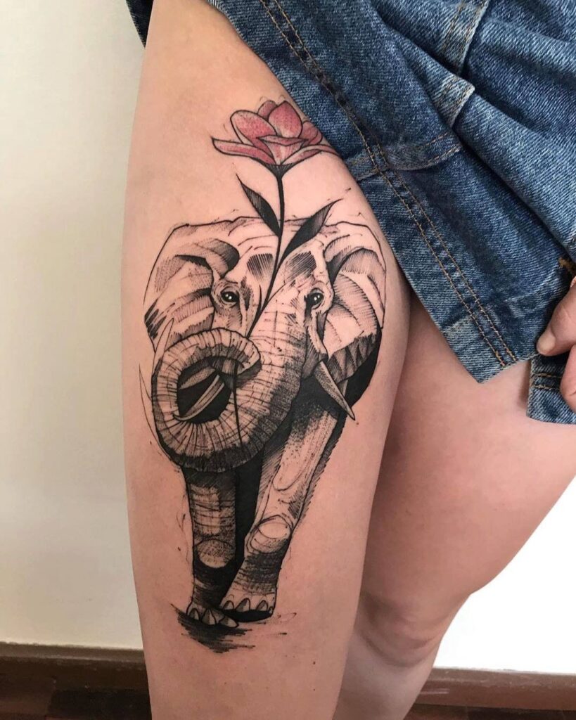 Elephant tattoo on the hip for women