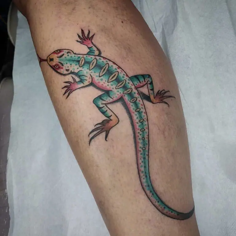 Tattoo of a colored lizard on the arm for men