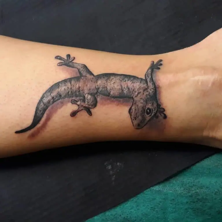 Lizard tattoo on the arm