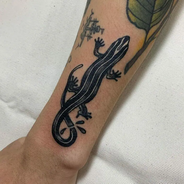 Lizard tattoo on the forearm for men