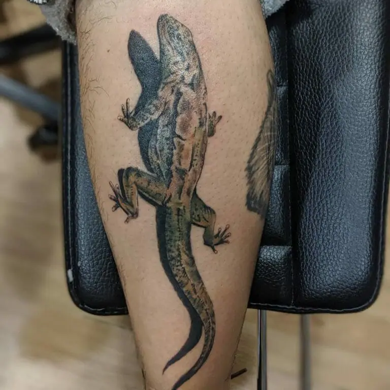 Lizard tattoo on the calf for men