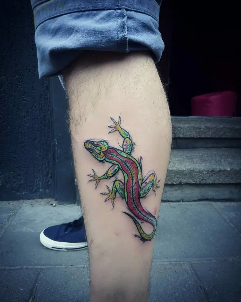 Lizard tattoo on the shin for men