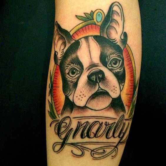 Tattoo of a dog on the shin for men