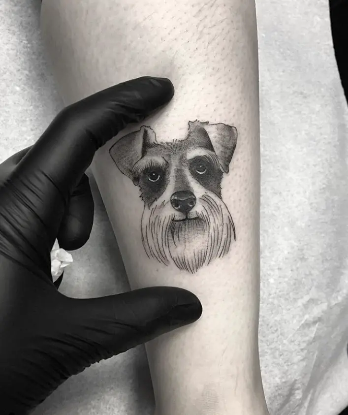 Tattoo of a dog on the forearm for men