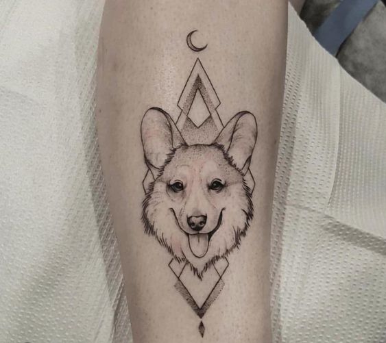 Dog tattoo on the shin for men