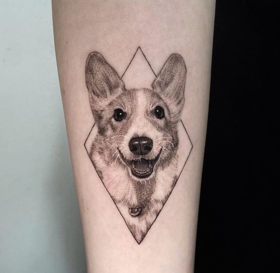 Tattoo of a dog on the forearm for men