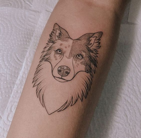 Tattoo of a dog on the forearm for men