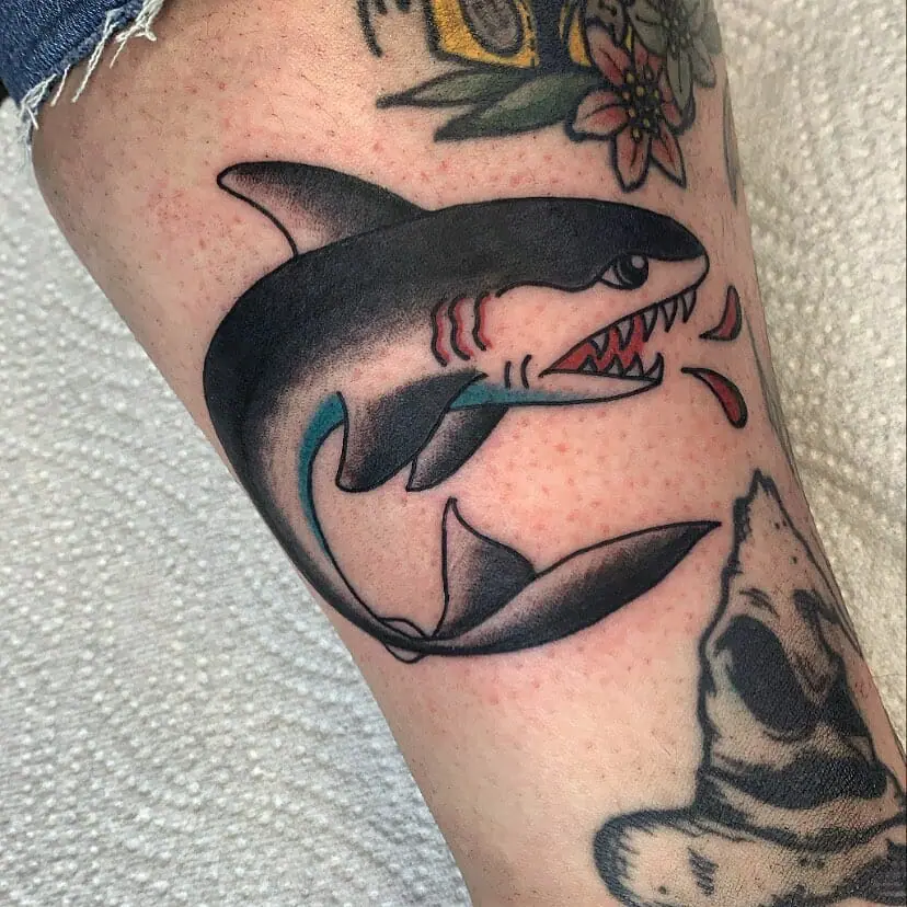 Colorful shark tattoo on the leg for men