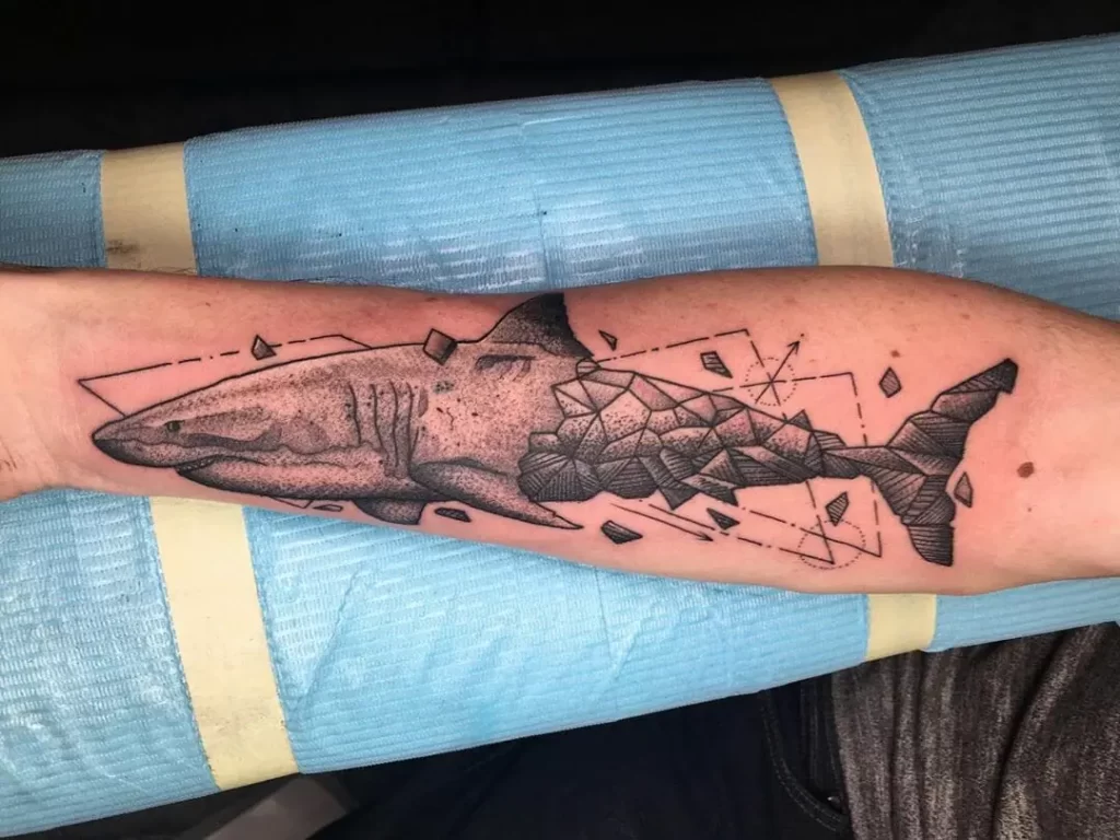 Large shark tattoo on the arm for men