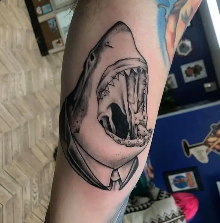 Large shark tattoo on the arm for men