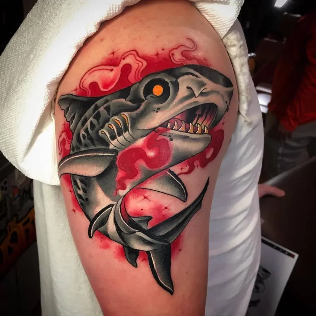 Colorful shark tattoo on the shoulder for men