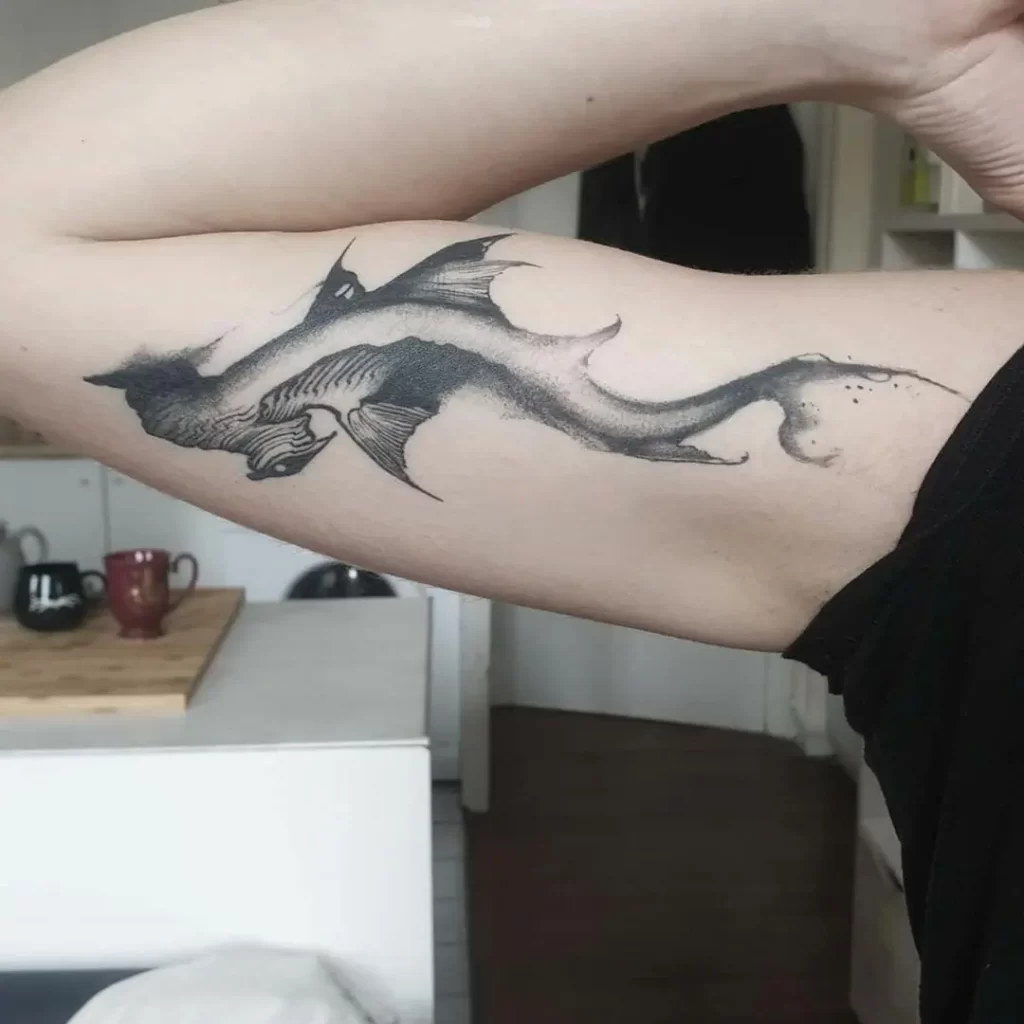 Large shark tattoo on the shoulder for men