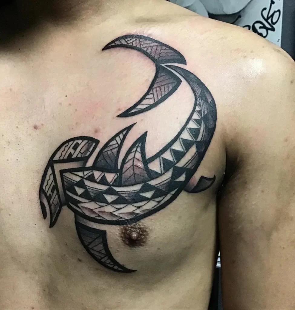 Shark tattoo on the chest for men