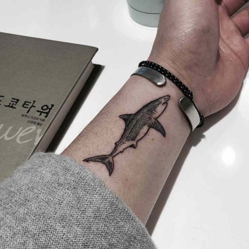 Shark tattoo on the arm for men