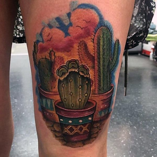 Colorful cactus tattoo on the thigh for women