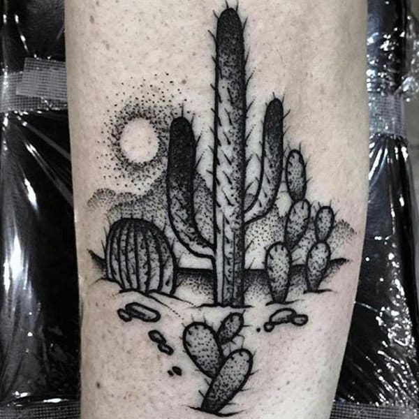 Tattoo of a cactus on the leg for men