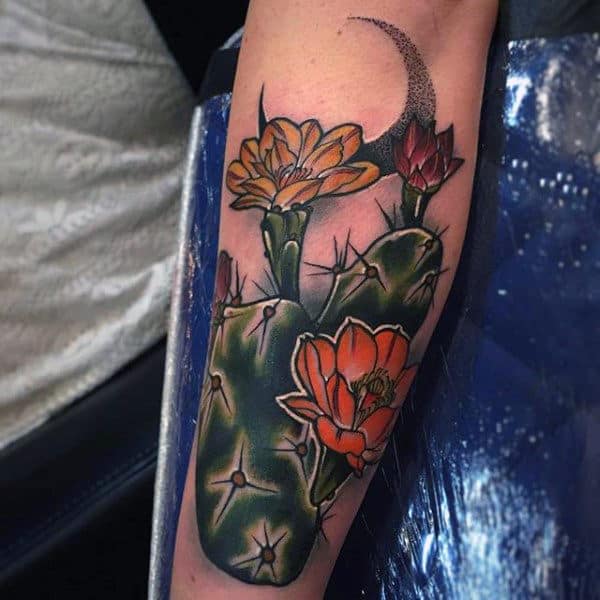 Colorful cactus tattoo on the forearm for women