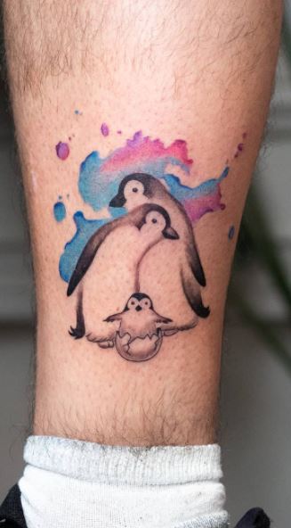 Tattoo of a penguin on the shin for men