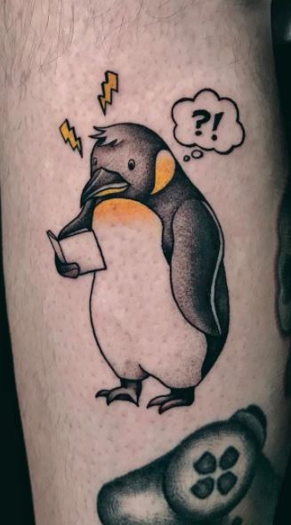 Tattoo of a penguin on the leg for men