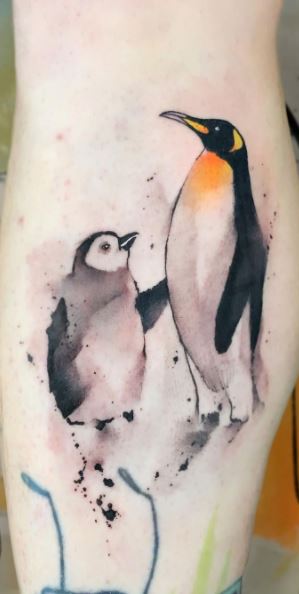 Penguin tattoo on the calf for men