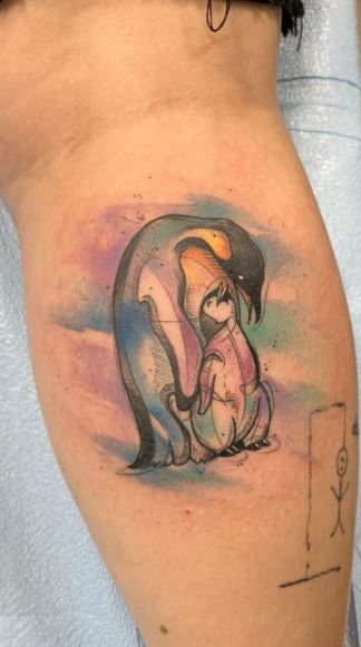 Penguin tattoo on the calf for men