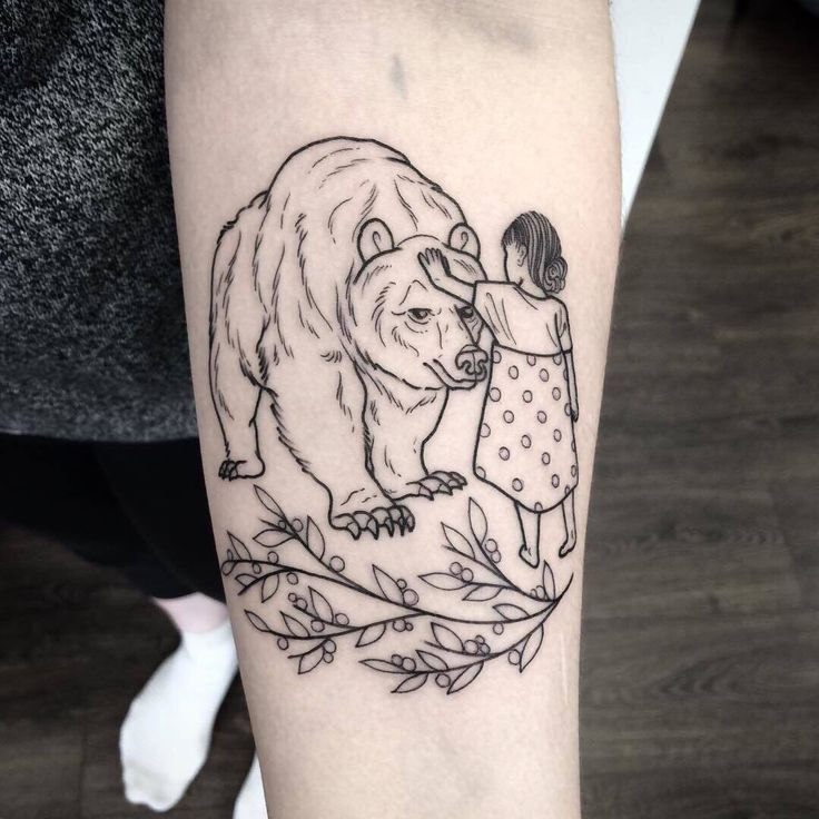 Bear and girl tattoo on forearm for women