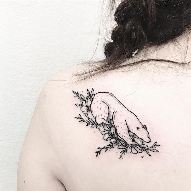 Bear and flower tattoo on the shoulder blade for women