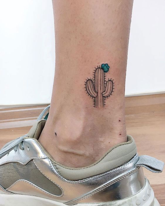 Colorful cactus tattoo on the shin for men