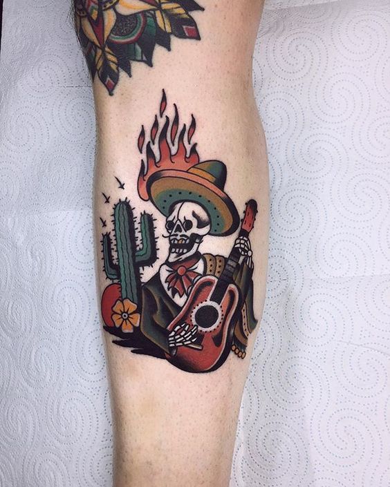 Colorful cactus tattoo on the shin for men