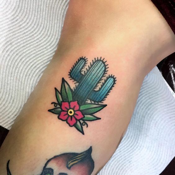 Colorful cactus tattoo on the shin for women